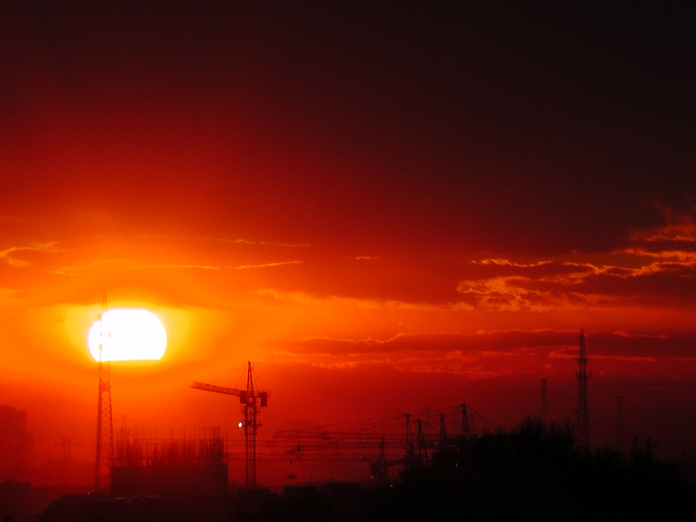 Sunset Under Construction In Beijing