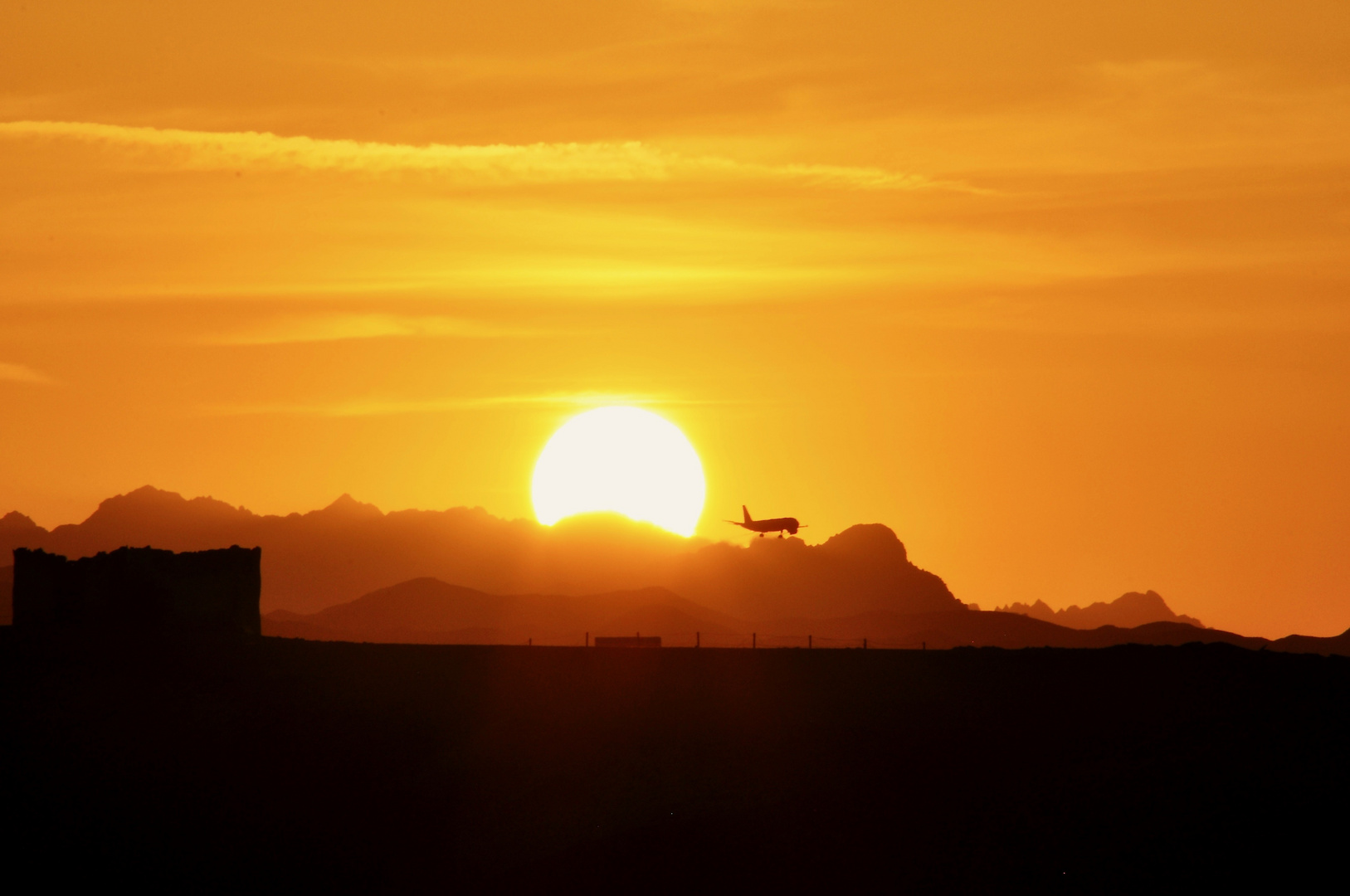 sunset with plane