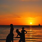 sunset with surfers