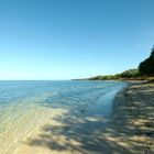 Sur la plage à Poé