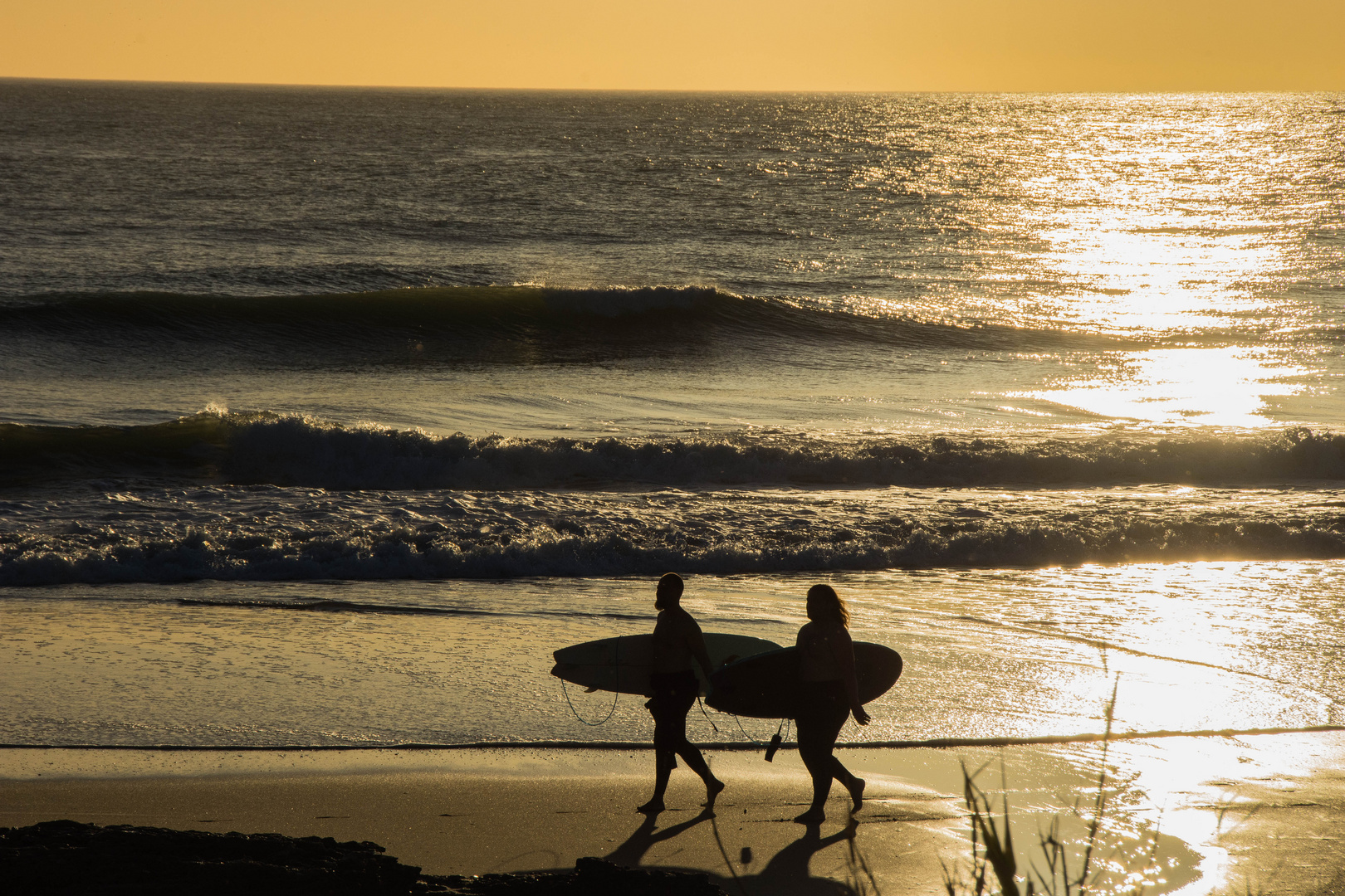 Surfer am Abend