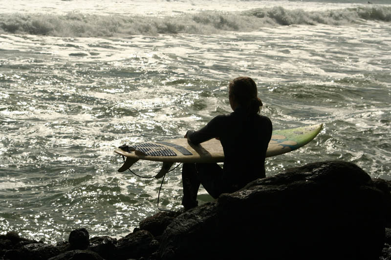 Surfer at Piha (New Zealand)