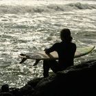 Surfer at Piha (New Zealand)