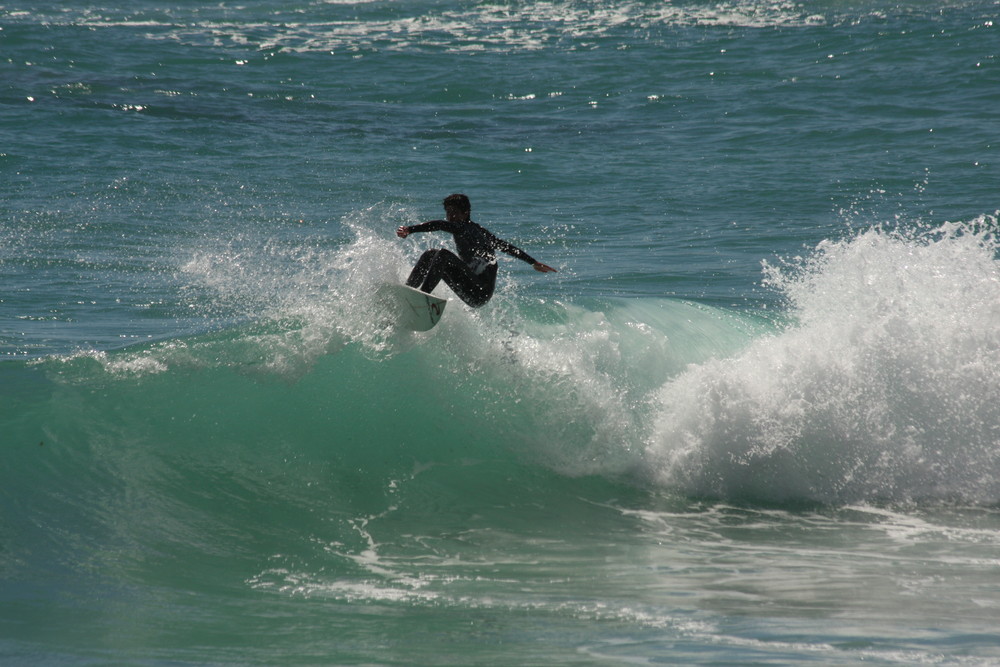 Surfer in Camps Bay, Capetown