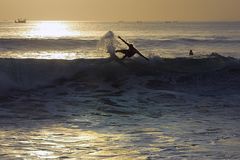Surfer scene on the Dreamland beach at Uluwatu