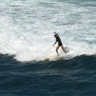 Surferin vor Maui