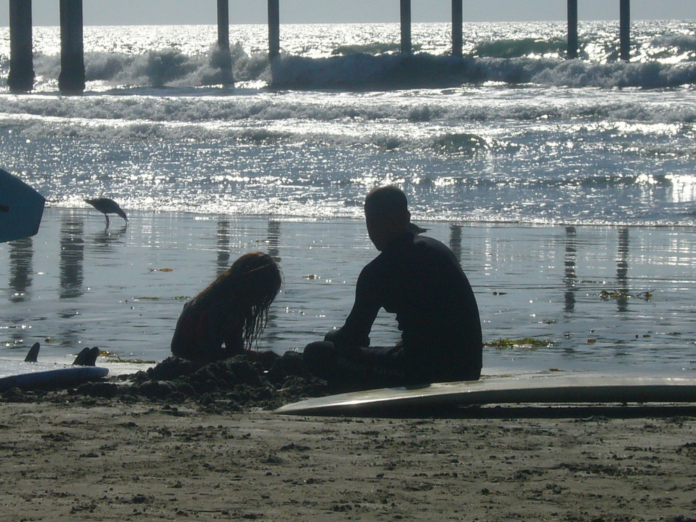 Surferpapa mit Surfertöchterchen