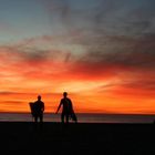 Surfers at Sunset