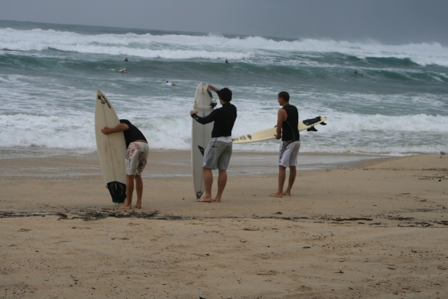 surfers at the beach