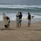 surfers at the beach