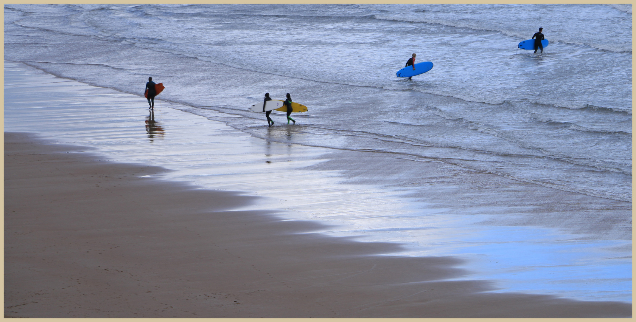 surfers at tynemouth