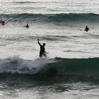 Surfeurs à Biarritz en début de soirée