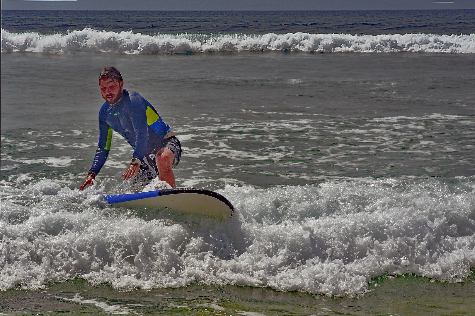 Surfing at Belangan beach