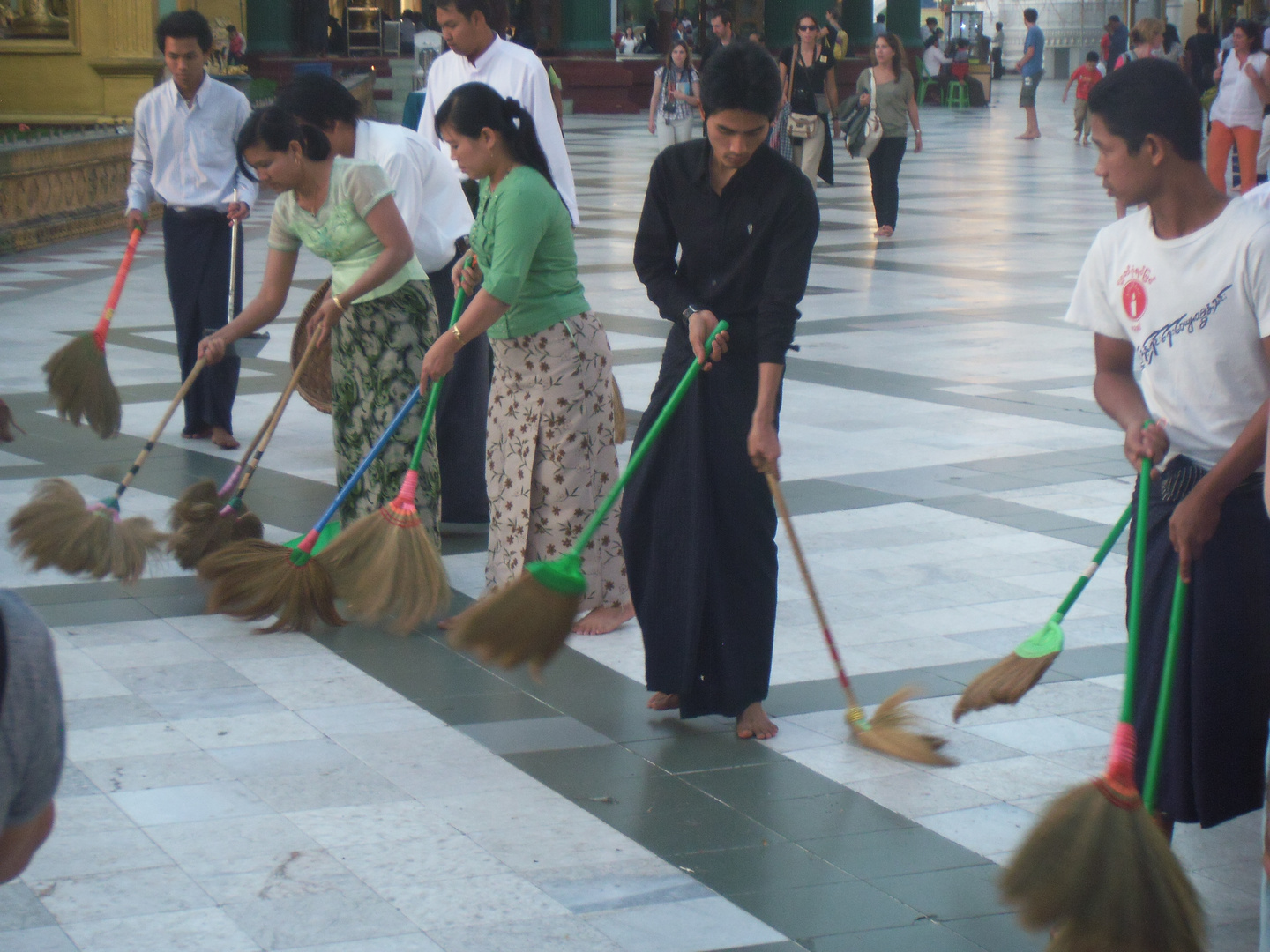 sweeping the shwedagon pagoda