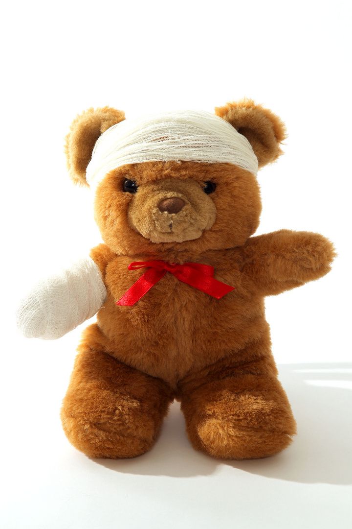 Symbolbid Teddybär mit Verband