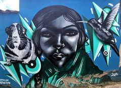 Symbolstarkes Graffiti an der Hauswand 