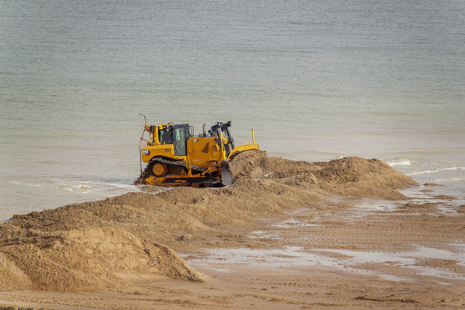 Sysiphus Arbeit am Strand