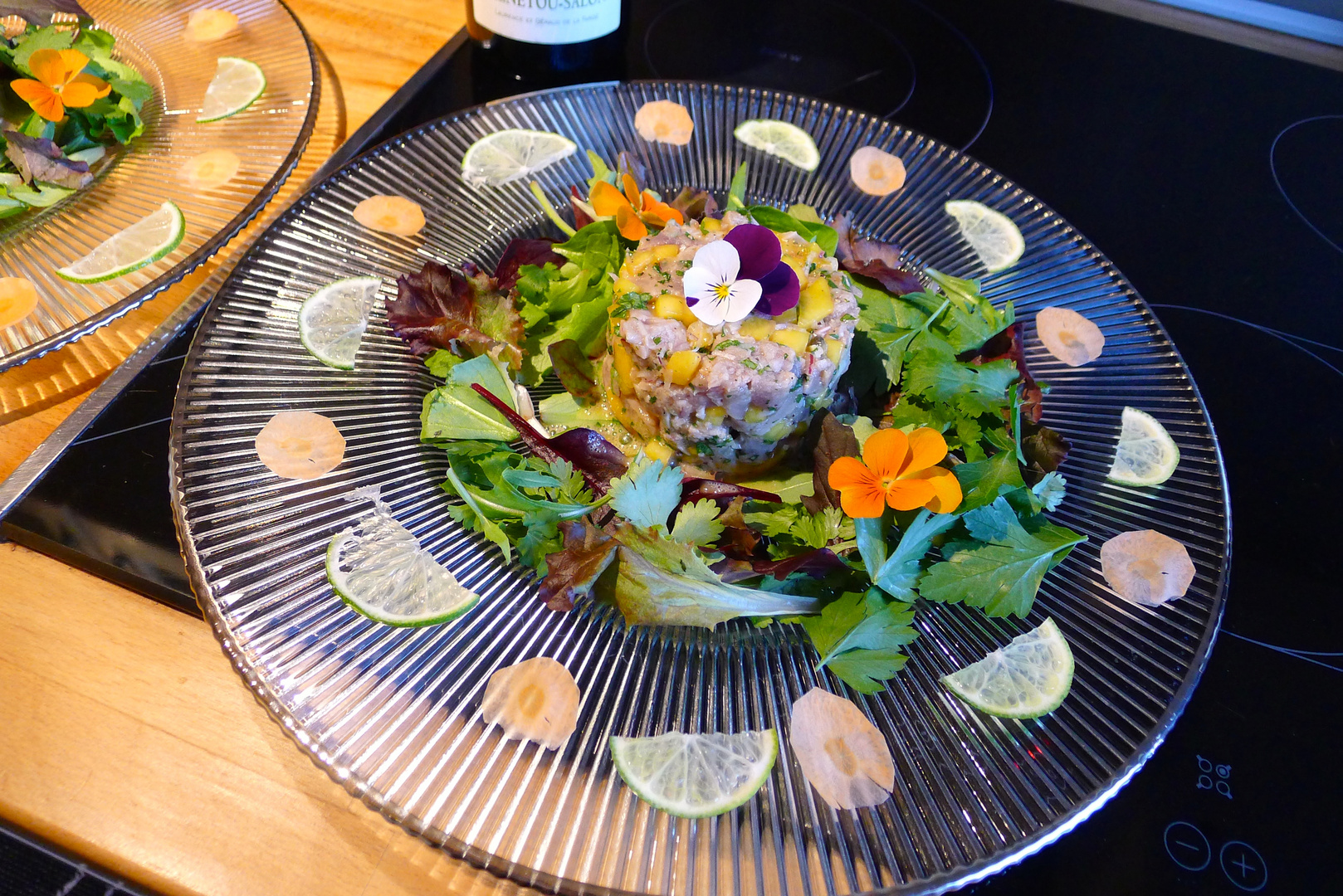 Tartare de poissons, mangue et vinaigrette aux  fruits de la passion