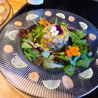 Tartare de poissons, mangue et vinaigrette aux  fruits de la passion