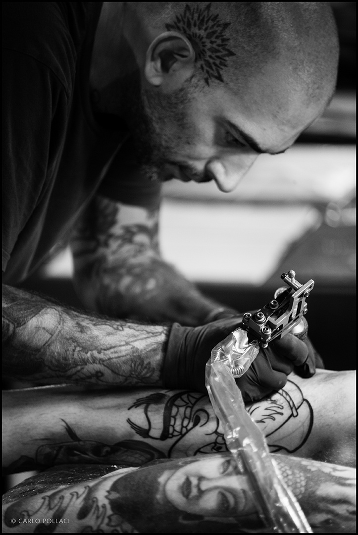 Tattoo artist at work