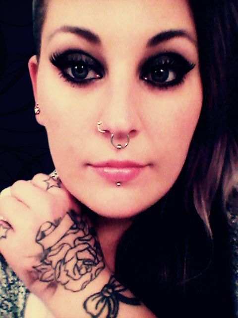 Tattoos,Piercings and black eyes...