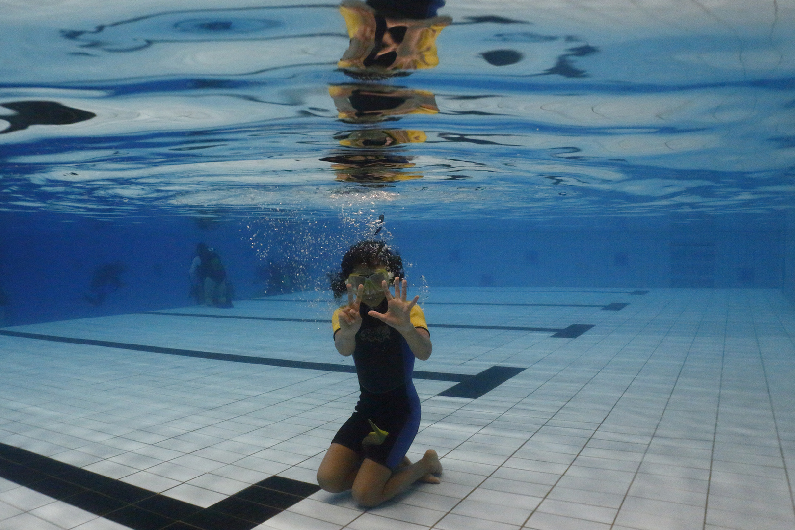 Tauchübungen im Schwimmbad