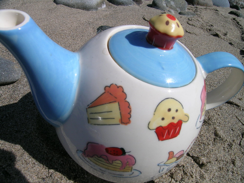 Teapot on the beach