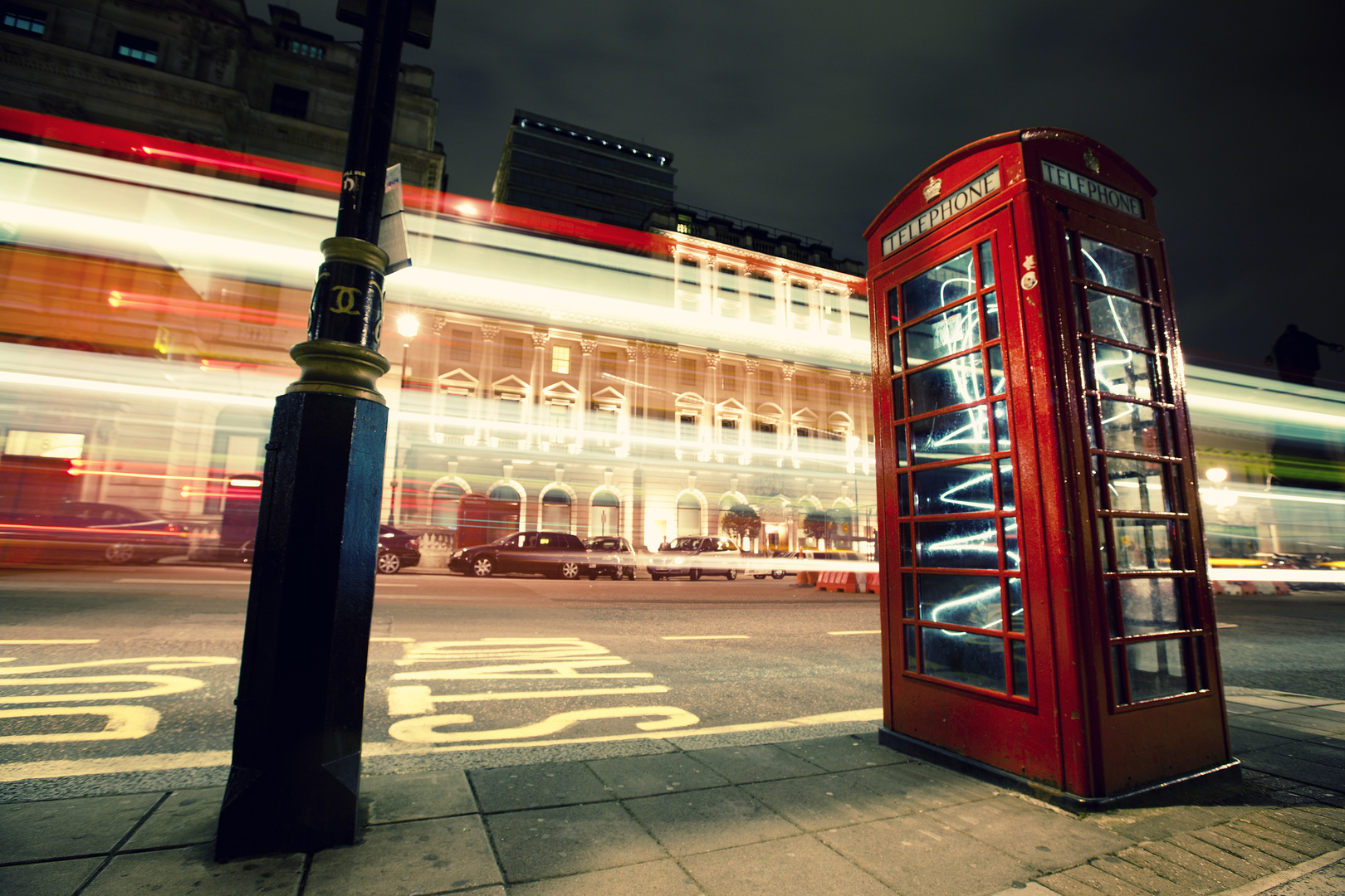 Telephone box at night