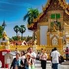 Temple worshippers circumnavigate the chedi