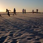 Tempête de sable à Camps Bay avec coucher du soleil