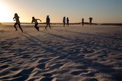 Tempête de sable à Camps Bay avec coucher du soleil