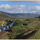 Tesco freight train approaching the pass of Drumochter