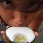 Thai girl eating fruits