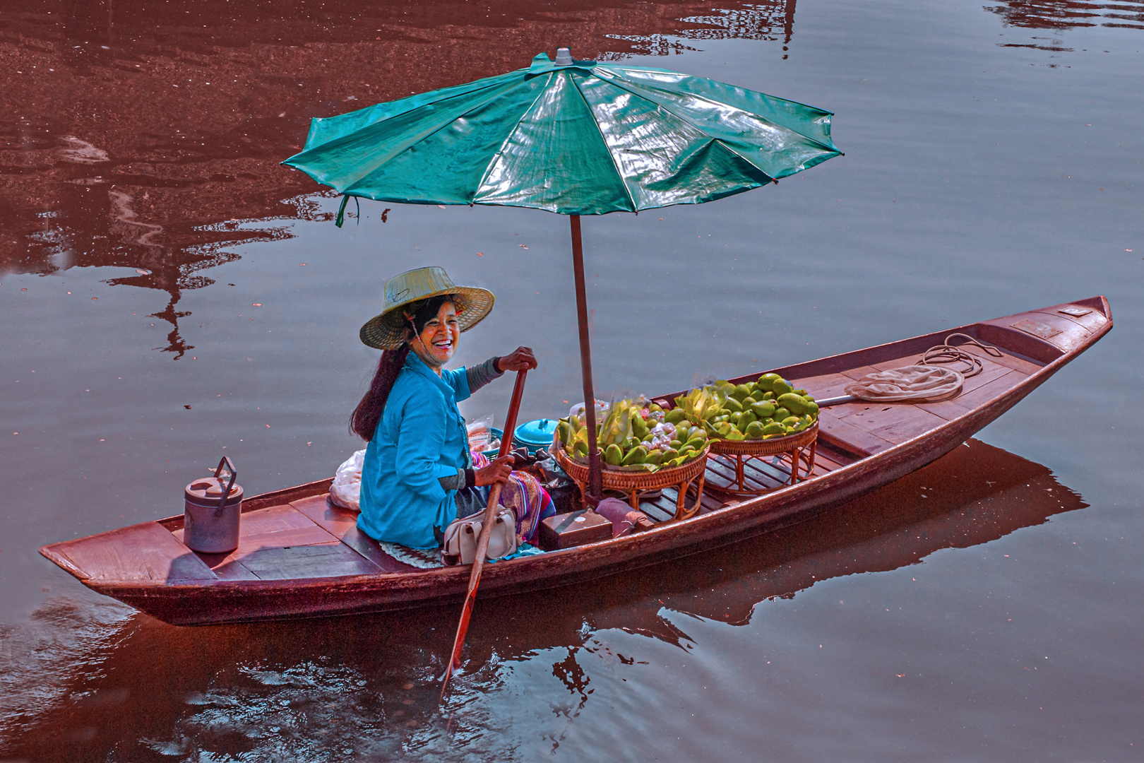 Thai vendor woman selling Mangos