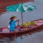 Thai vendor woman selling Mangos