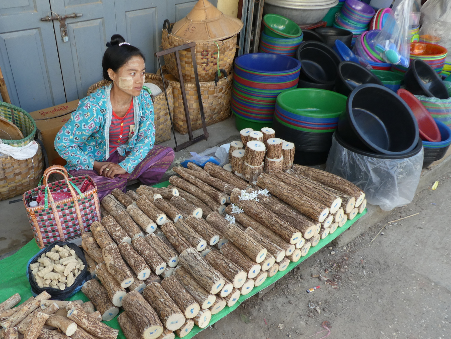 Thanaka Wood Seller in Myan Aung  -  Myanmar