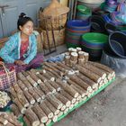 Thanaka Wood Seller in Myan Aung  -  Myanmar