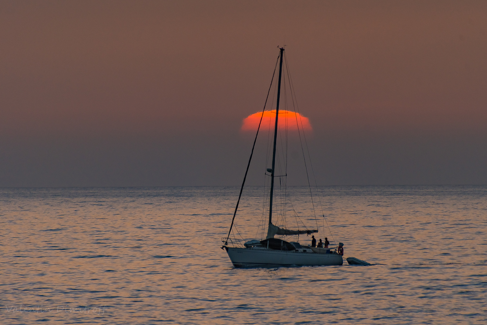 The boat and half sun