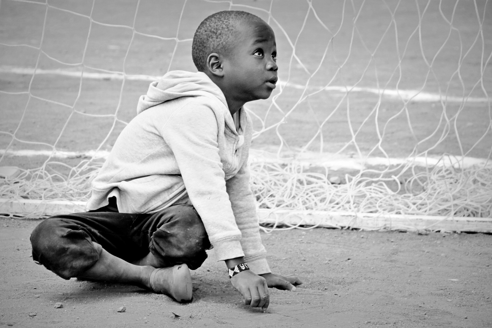 The boy on the football pitch. | © Tom Rübenach