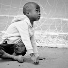 The boy on the football pitch. | © Tom Rübenach