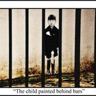 The child painted behind bars