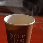 The cup of cafe in the outside