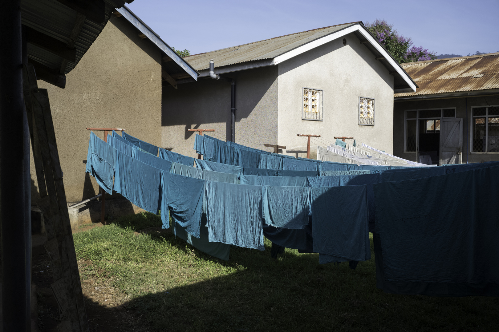 The district hospital - theatre gowns drying in the sun