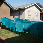 The district hospital - theatre gowns drying in the sun