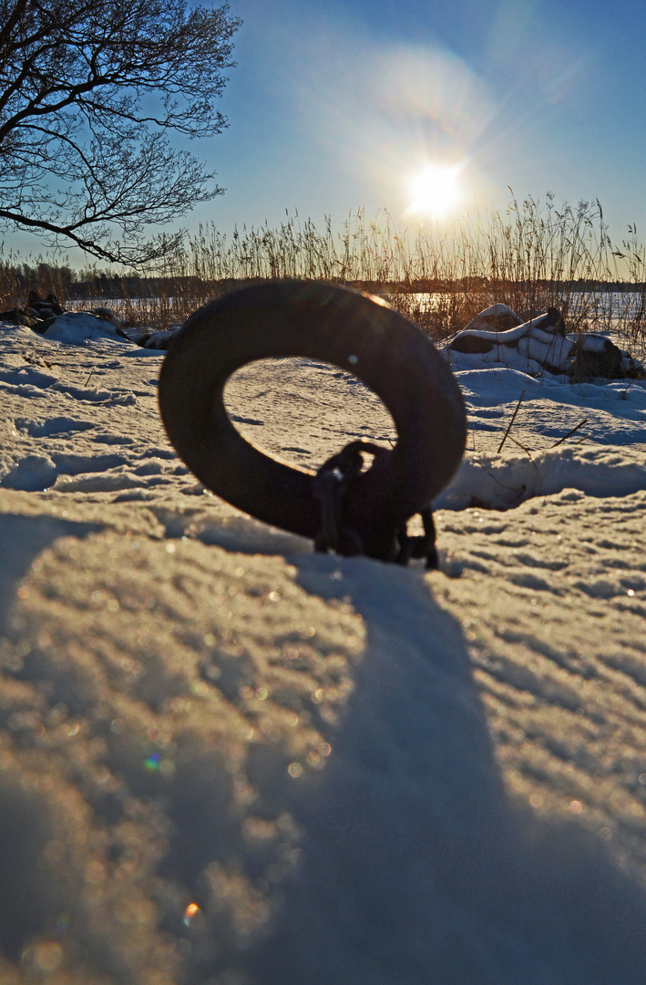 The fastening ring on the coastal against the sun light