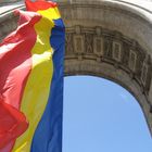 The flag of liberty under the Arch of Triumph (Bucharest)