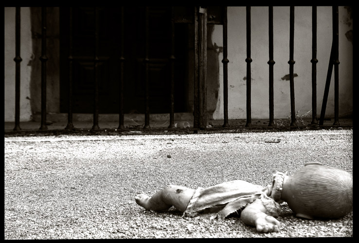 … the forgotten child into the front of a closed church …