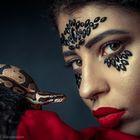 THE GIRL AND HER SNAKE