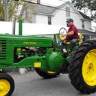 The green old  John Deere tractor