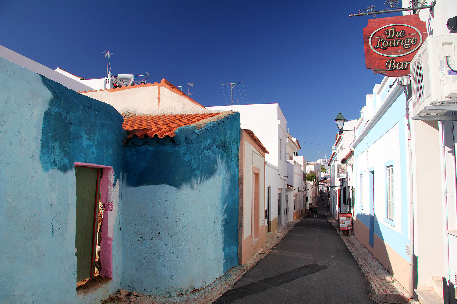 "The Lounge Bar" in the street of Alvor